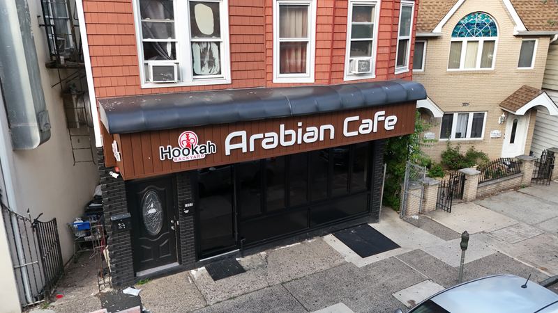 Aerial of the Arabian Cafe storefront and sign