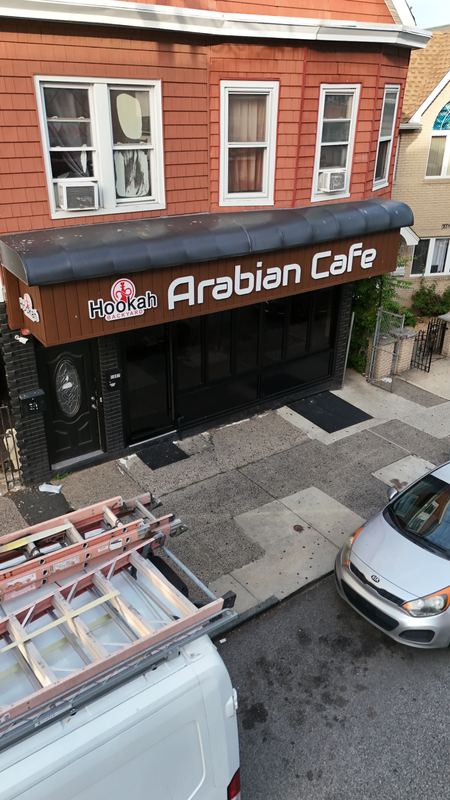 Drone view of the Arabian Cafe awning and entrance